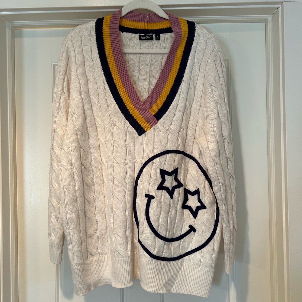 Lovesick smiley face sweater
